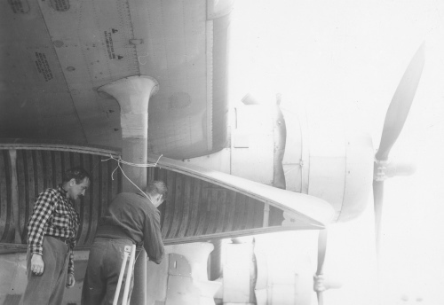 Jacques Rousseau Collection - c-3659-a-I-5609 -A?roport de Fort-Chimo. Installation de mes canots sous les ailes d'un canso.